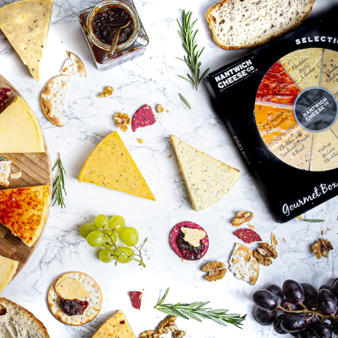 gourmet cheese selection wheel gift present family dinner party friends cheddar cheese cheeseboard herbs garlic pepper double gloucester chives onion ale mustard vintage mature tomato basil hot mexican red leicester smokey valentines fathers day mothers christmas secret santa